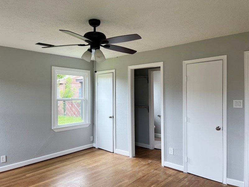 3522 Rosedale Street Houston, TX 77004 - Photo 8 of 22 a view of a livingroom with a window and wooden floor