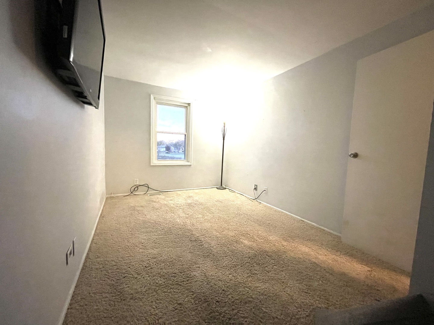 1455 Elder Drive Aurora, IL 60506 - Photo 11 of 19 a view of empty room with wooden floor and fan