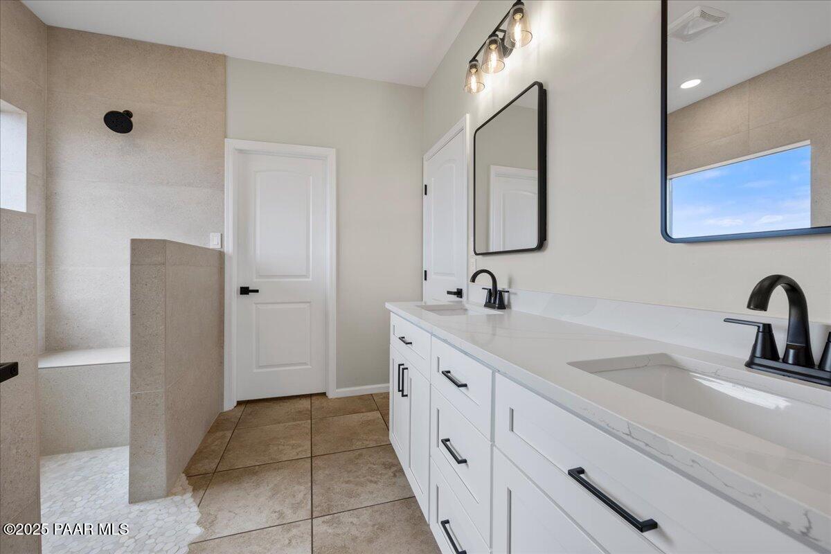 320 South Hoss Road Dewey, AZ 86327 - Photo 21 of 42 a spacious bathroom with a double vanity sink mirror and