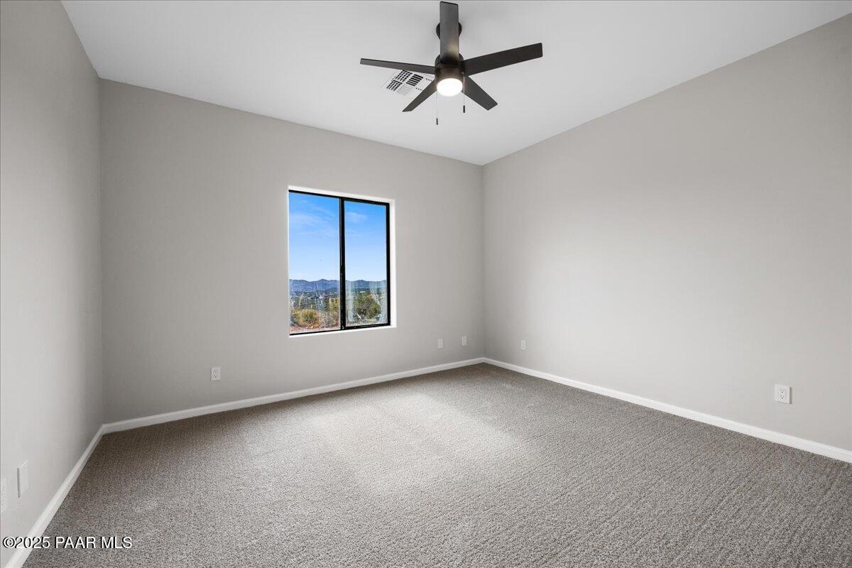 320 South Hoss Road Dewey, AZ 86327 - Photo 24 of 42 a view of an empty room with a window