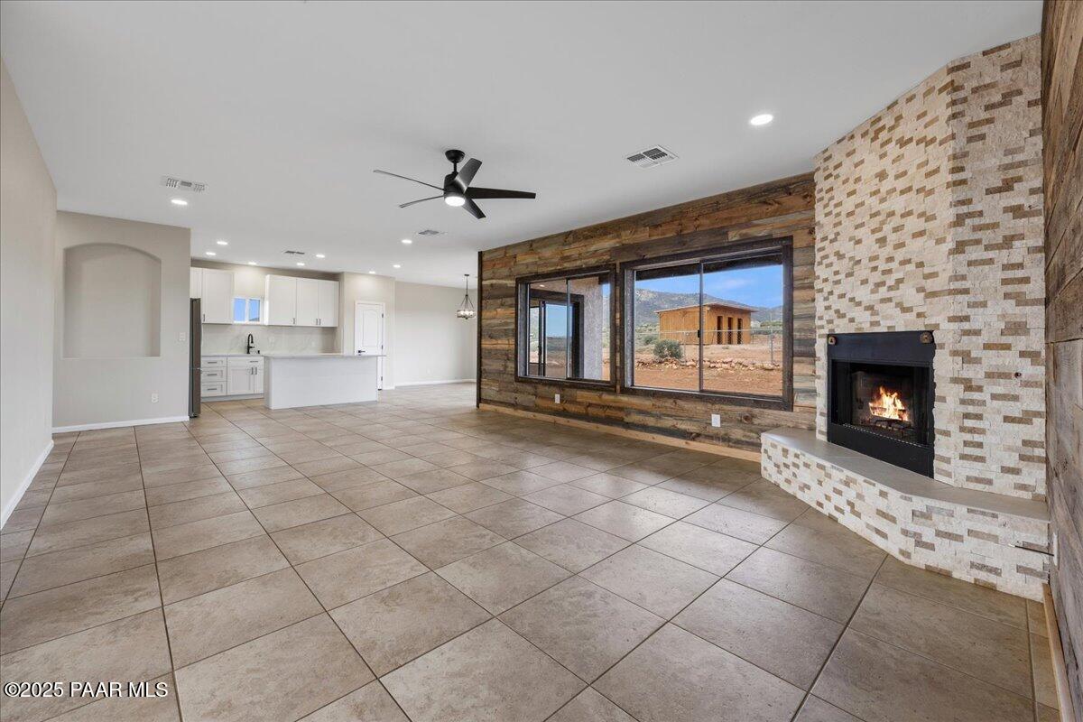 320 South Hoss Road Dewey, AZ 86327 - Photo 5 of 42 a view of an empty room and fire place