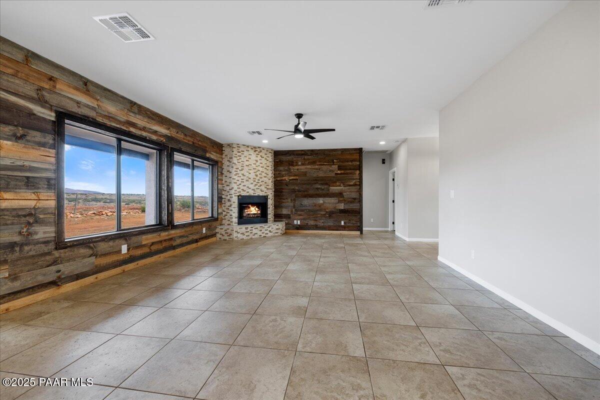 320 South Hoss Road Dewey, AZ 86327 - Photo 7 of 42 a view of an empty room with a fireplace