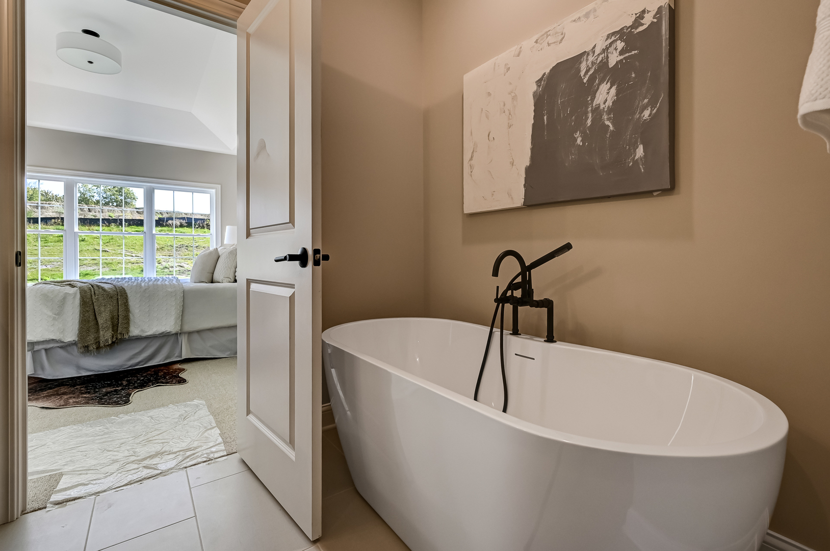 12215 Copper Ridge Drive, Unit 13 Lemont, IL 60439 - Photo 15 of 21 a white bath tub sitting in a bathroom next to a window