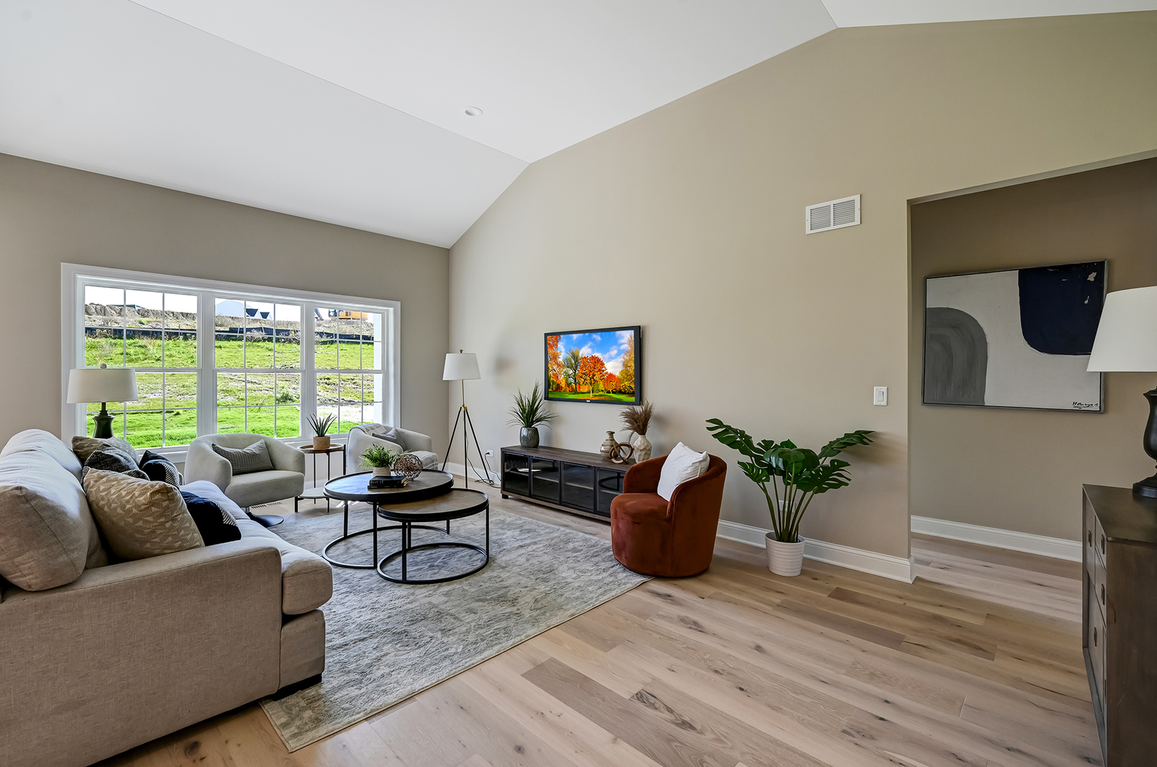 12215 Copper Ridge Drive, Unit 13 Lemont, IL 60439 - Photo 8 of 21 a living room with furniture and a flat screen tv