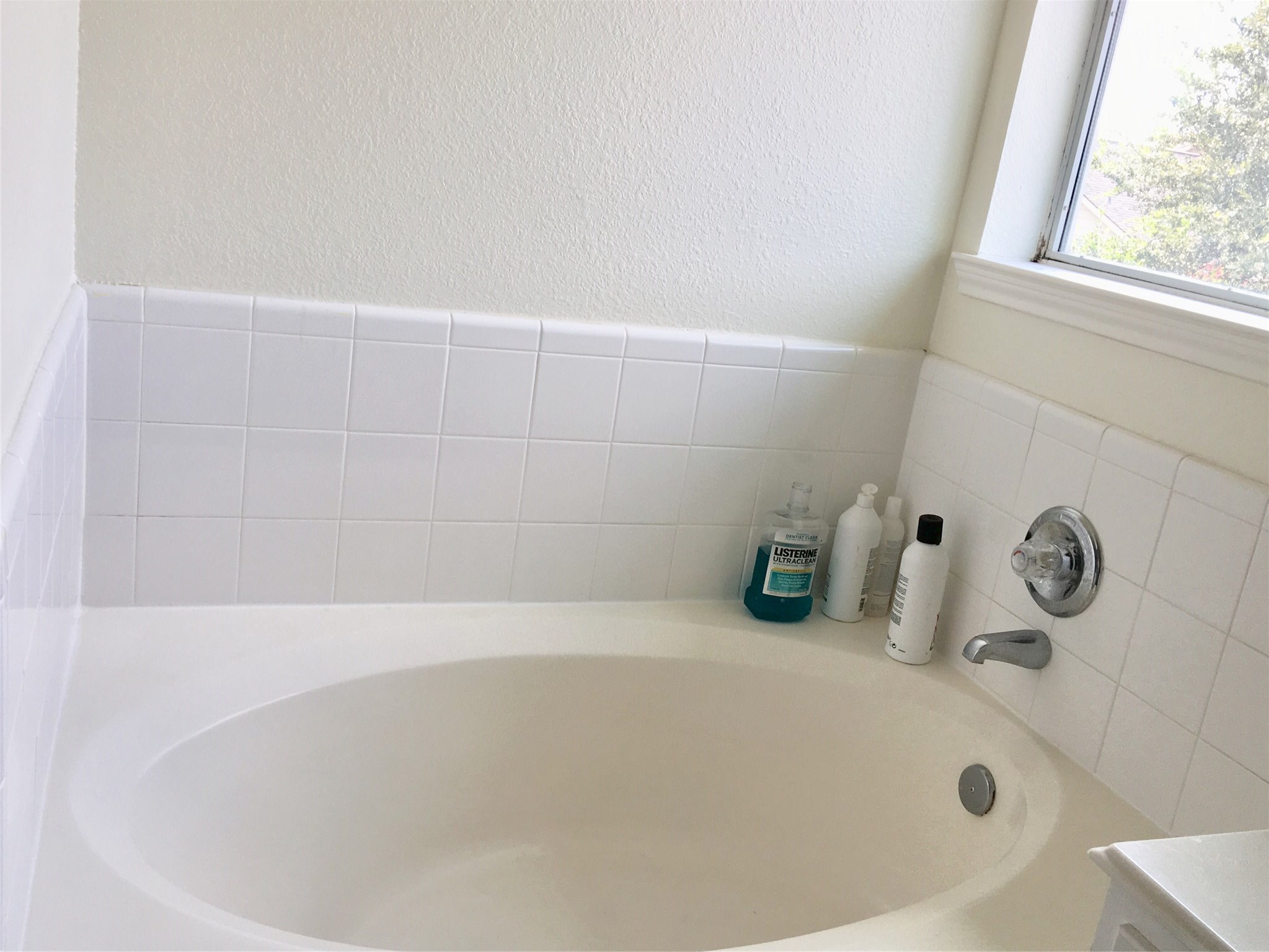 5707 Highbury Court Houston, TX 77084 - Photo 11 of 17 a bathroom with a bathtub