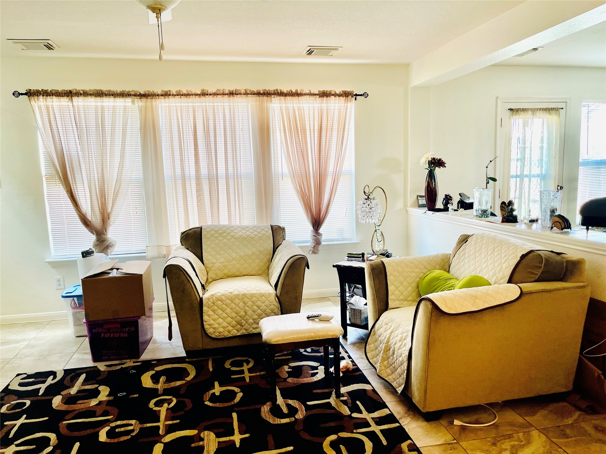 5707 Highbury Court Houston, TX 77084 - Photo 2 of 17 a living room with furniture and a large window