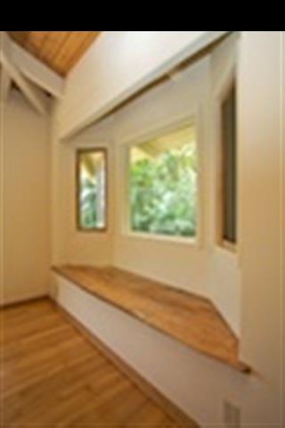 16 Hea'aula Haiku, HI 96708 - Photo 23 of 30 a view of a room with wooden floor and windows