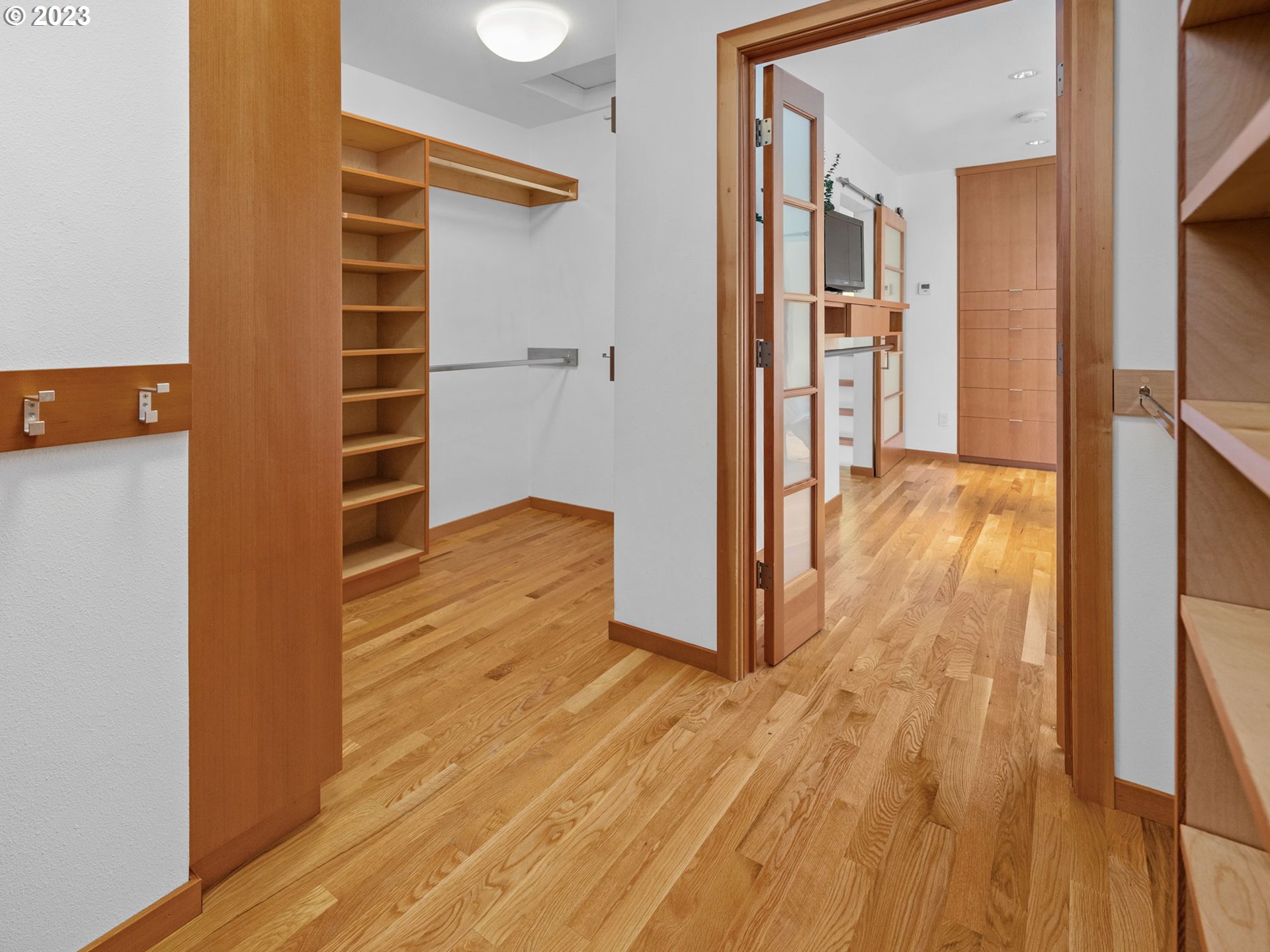 3727 Southwest Condor Lane Portland, OR 97239 - Photo 17 of 33 a view of wooden floor and windows in a room