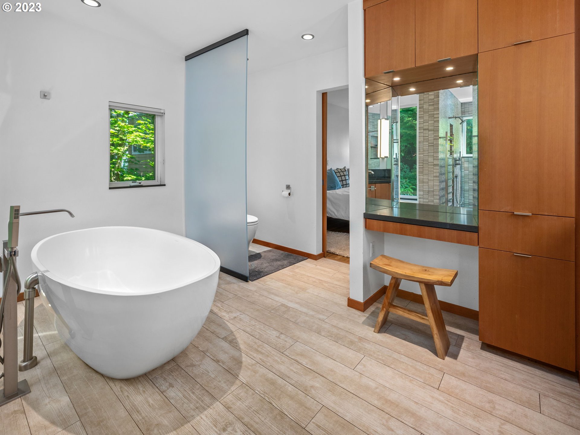 3727 Southwest Condor Lane Portland, OR 97239 - Photo 20 of 33 a living room with a window and a table