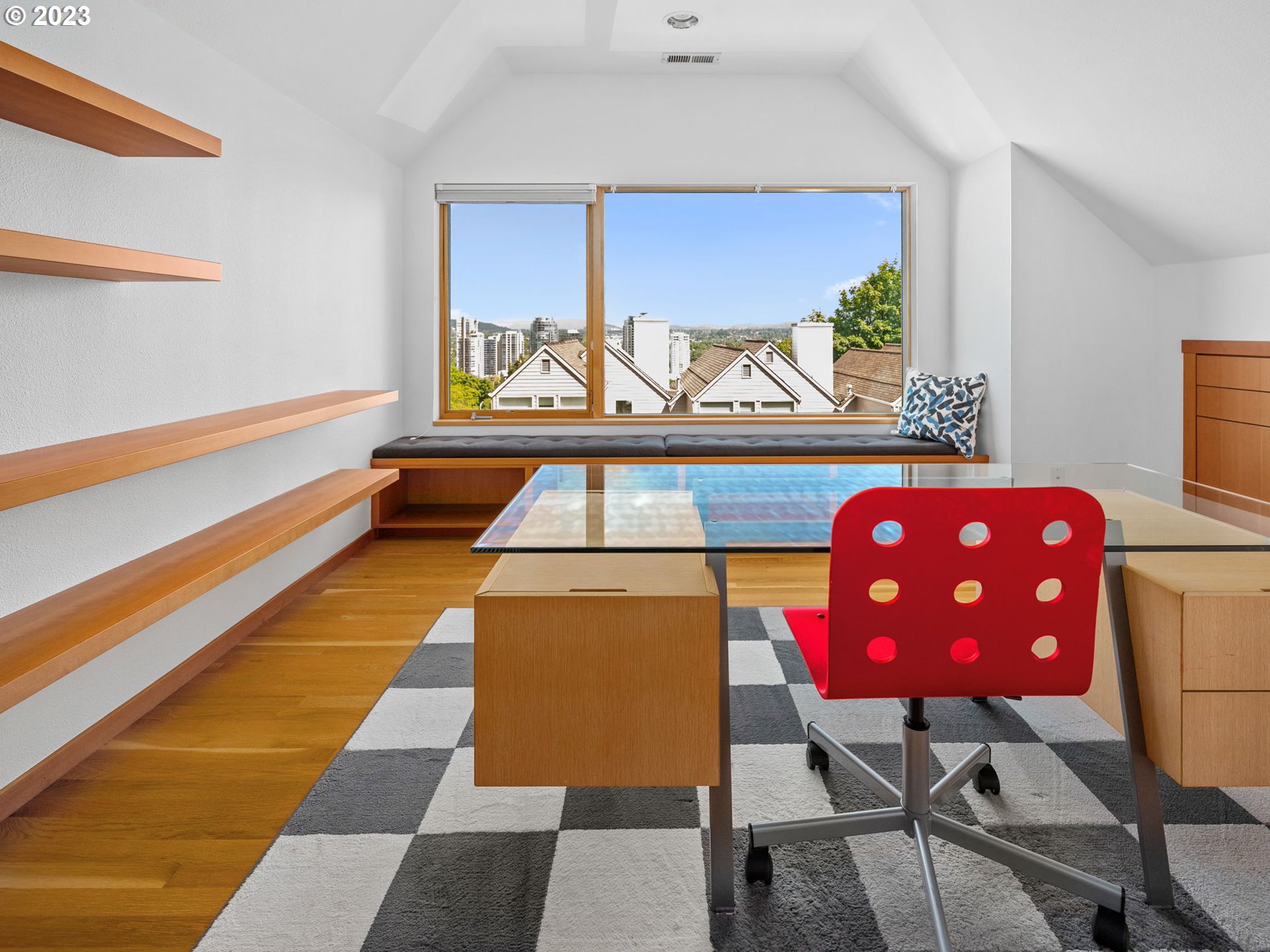3727 Southwest Condor Lane Portland, OR 97239 - Photo 23 of 33 a living room with a couch and a table