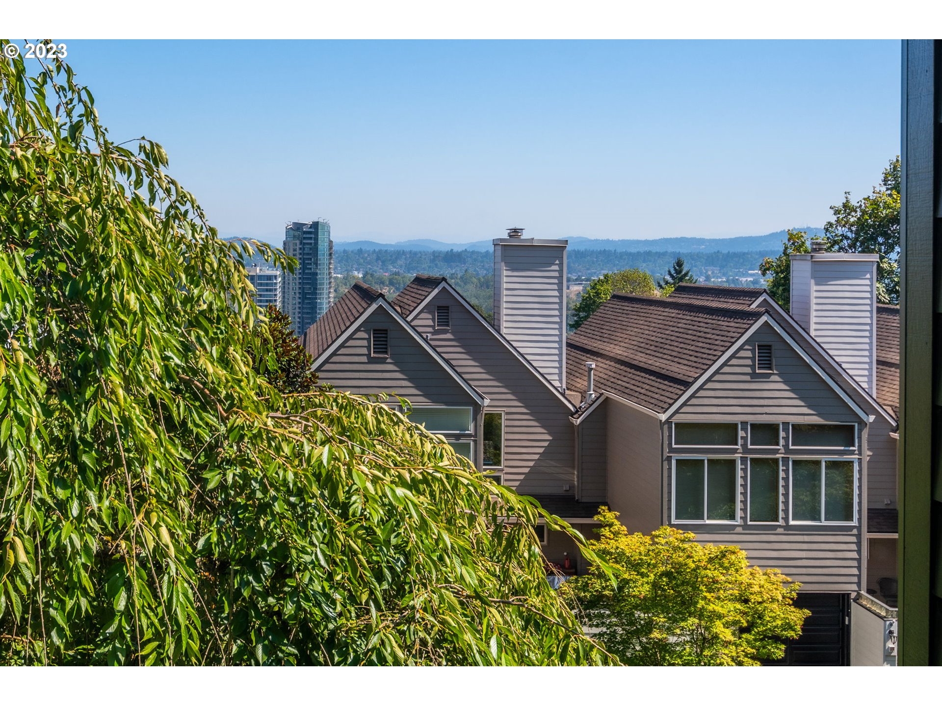 3727 Southwest Condor Lane Portland, OR 97239 - Photo 33 of 33 a front view of a house with a yard