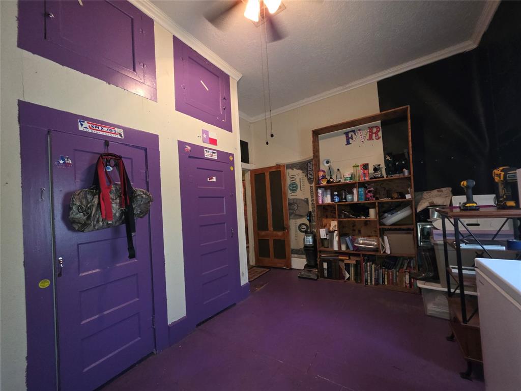 211 West Sabine Street Groesbeck, TX 76642 - Photo 26 of 40 a view of room with workspace