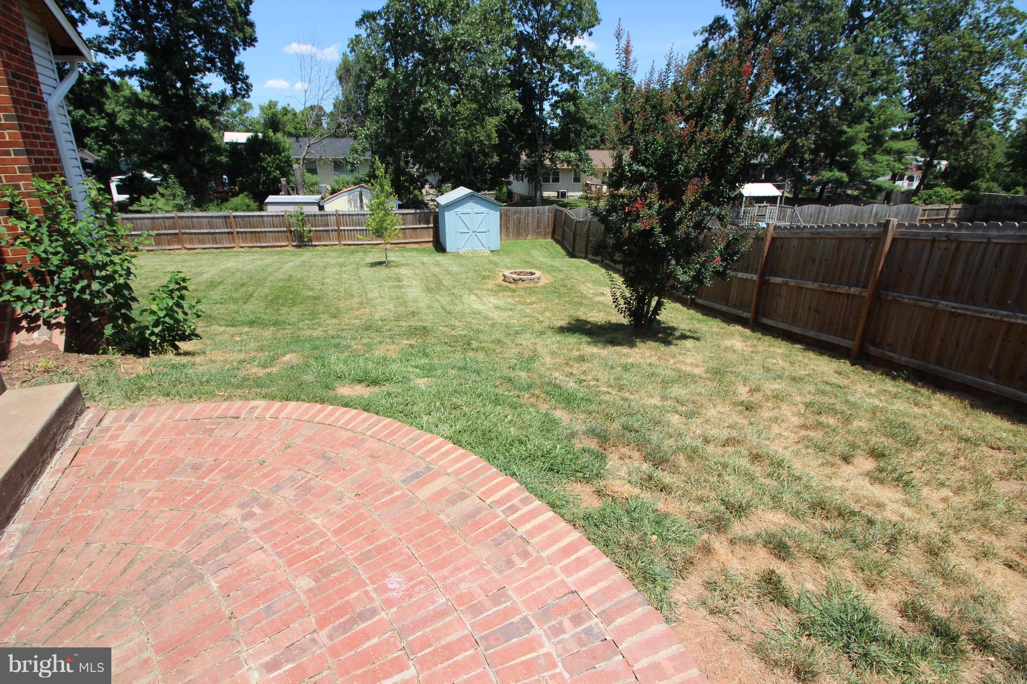9708 Botsford Road Manassas, VA 20109 - Photo 22 of 30 Imagine morning coffee on your pretty brick patio.
