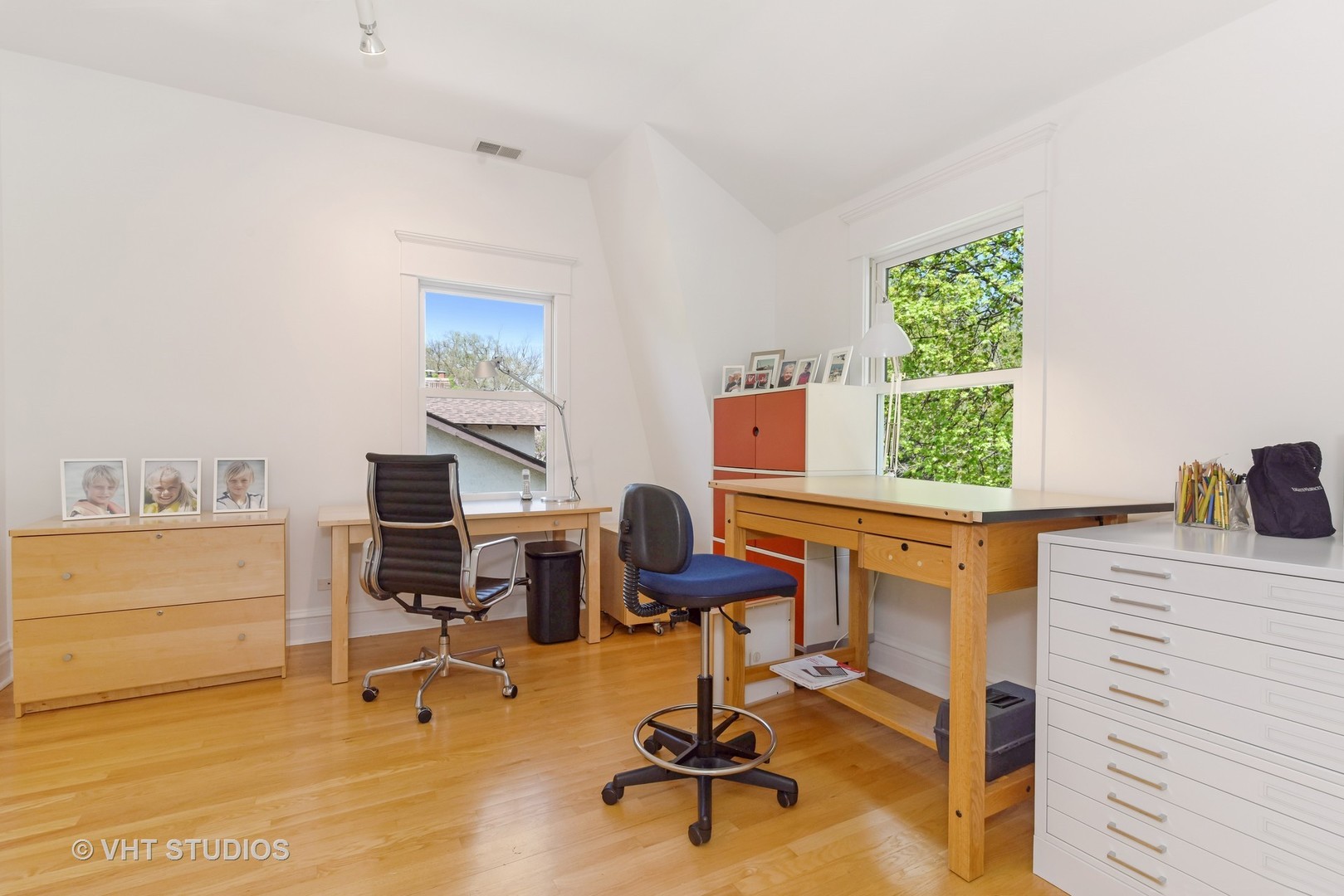 2234 Forestview Road Evanston, IL 60201 - Photo 34 of 76 a view of a workspace with furniture and a window