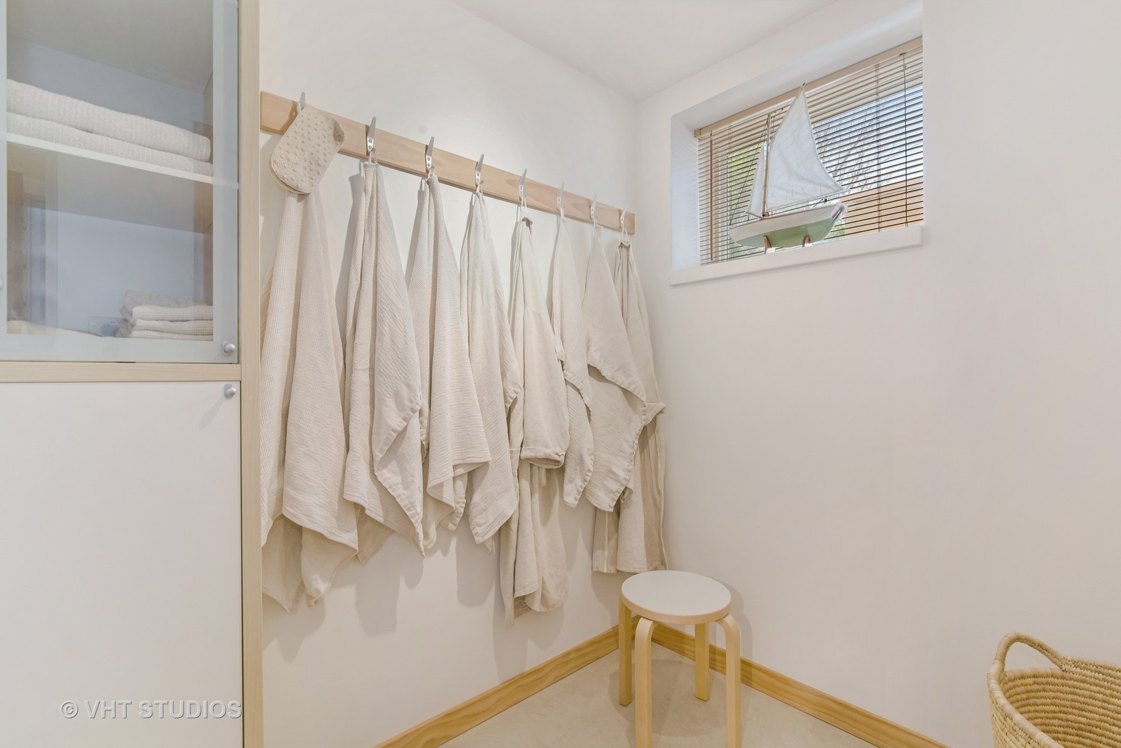 2234 Forestview Road Evanston, IL 60201 - Photo 42 of 76 a bathroom with a shower curtain and a sink