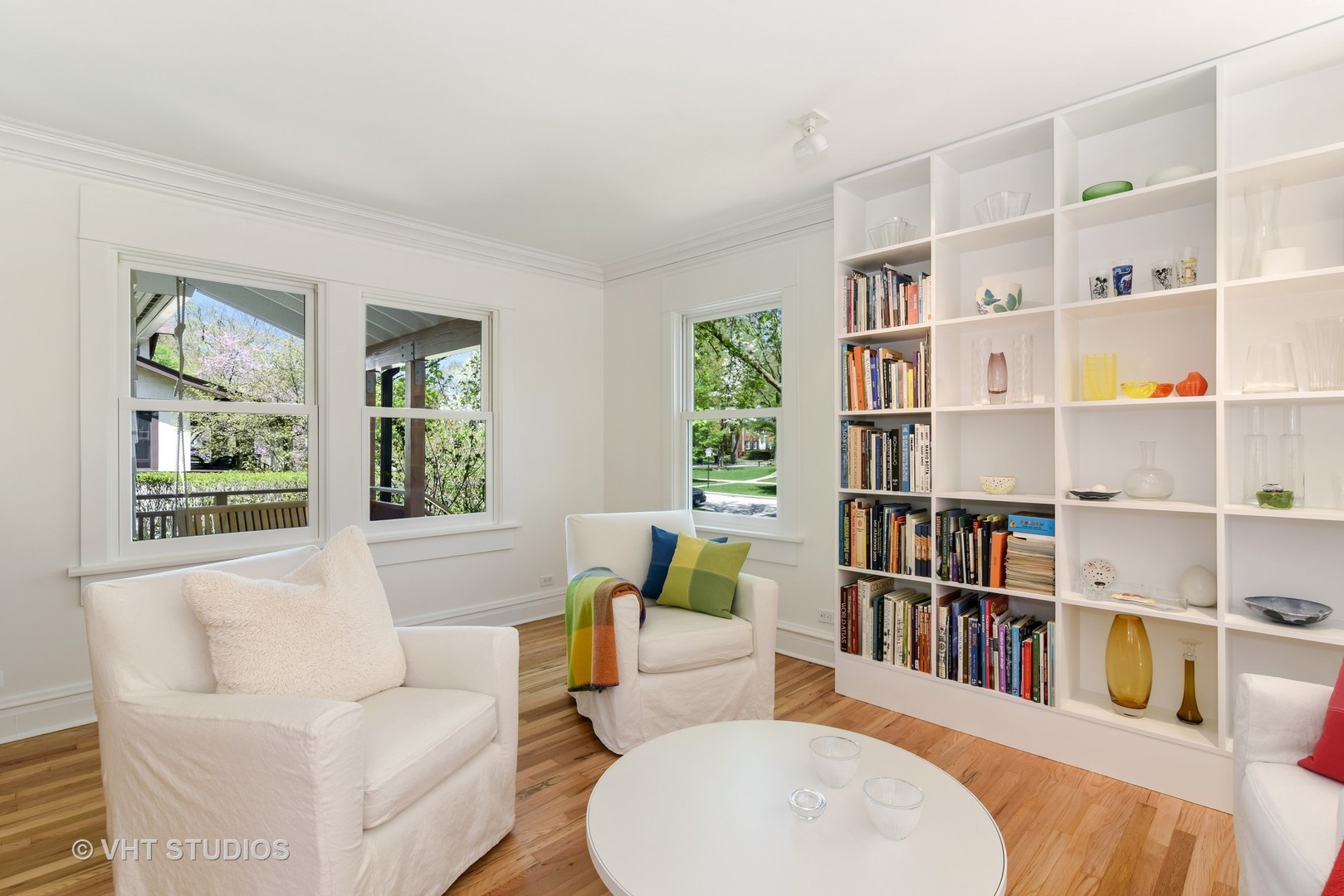 2234 Forestview Road Evanston, IL 60201 - Photo 56 of 76 a living room with furniture and a book shelf