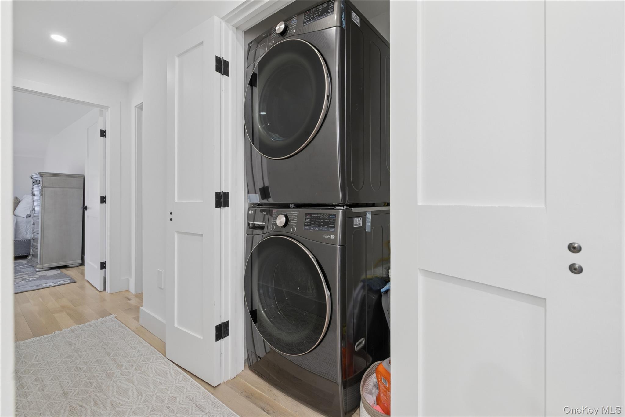 10 Sagamore Road Hampton Bays, NY 11946 - Photo 34 of 41 a utility room with dryer and washer