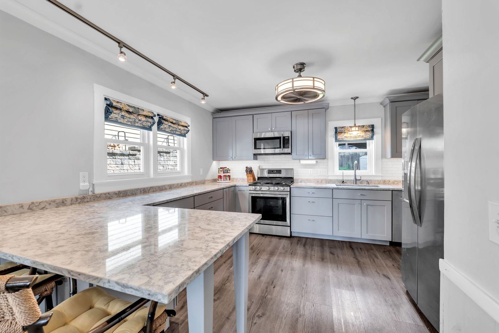 4018 Pitzen Road Johnsburg, IL 60051 - Photo 13 of 47 a kitchen with a stove a sink and a refrigerator