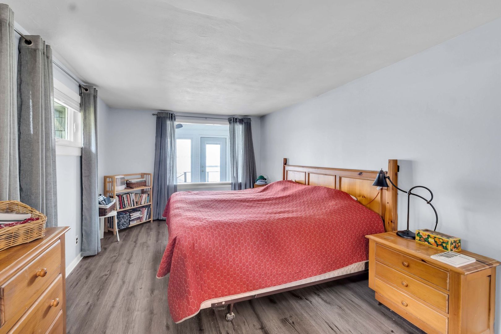 4018 Pitzen Road Johnsburg, IL 60051 - Photo 16 of 47 a bedroom with a bed and wooden floor