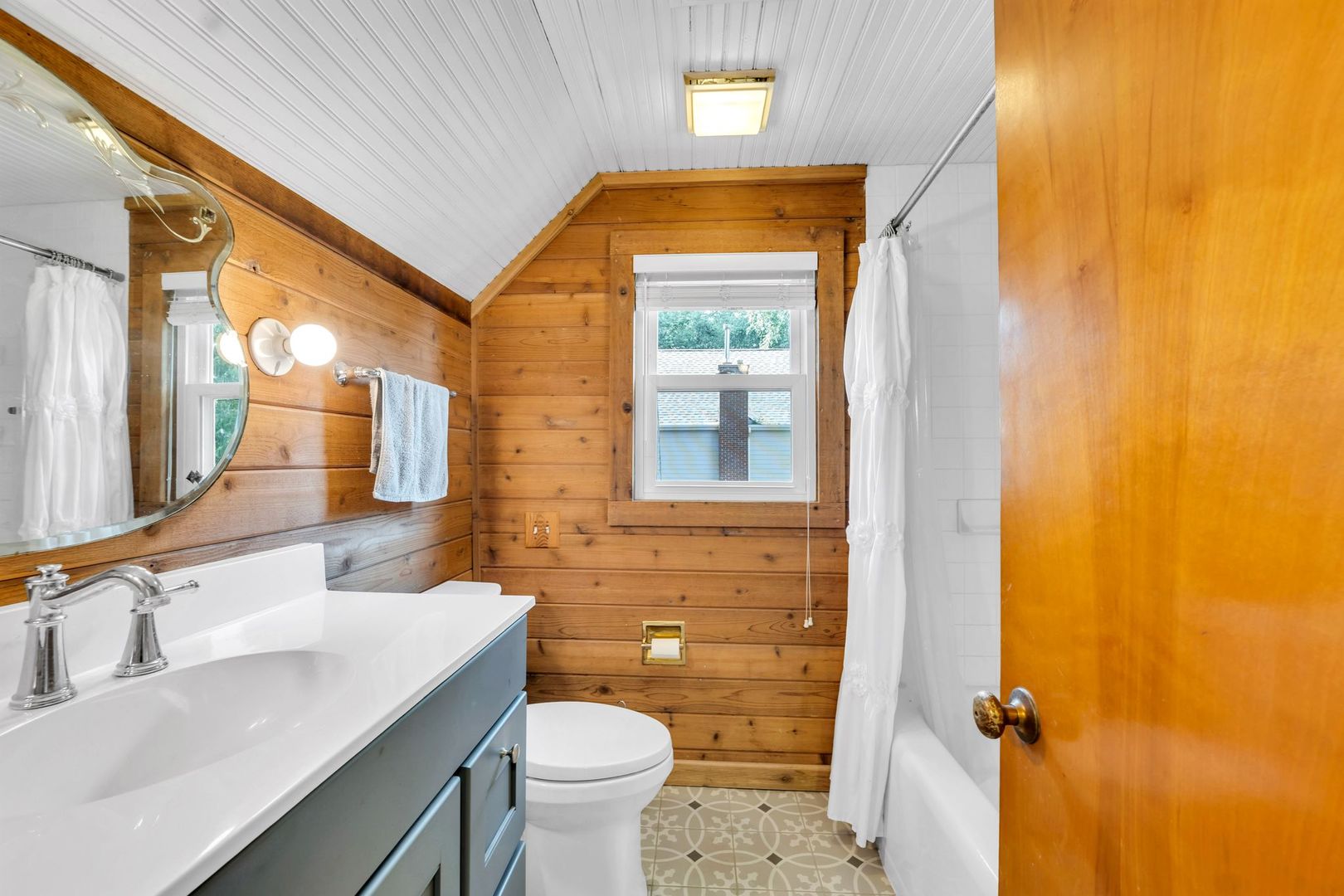 4018 Pitzen Road Johnsburg, IL 60051 - Photo 22 of 47 a bathroom with a sink and a mirror