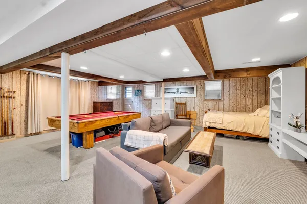 a kitchen with a sink stove top oven and cabinets