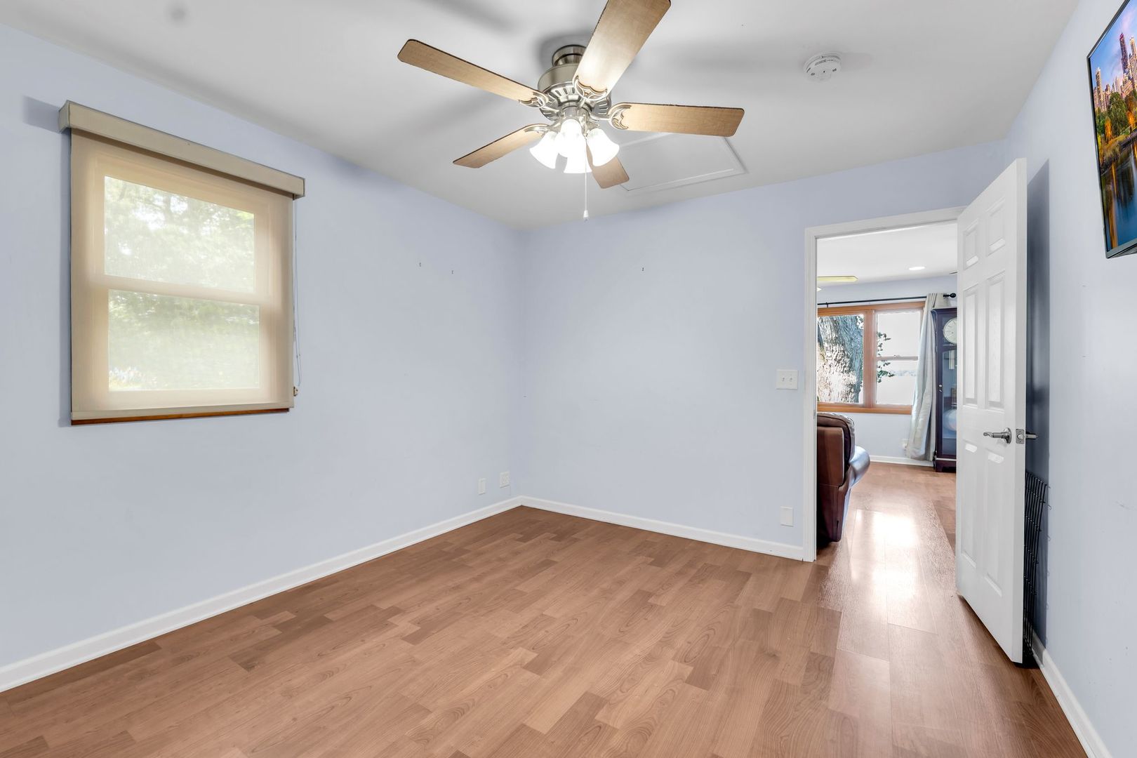 4018 Pitzen Road Johnsburg, IL 60051 - Photo 29 of 47 wooden floor in an empty room with a window