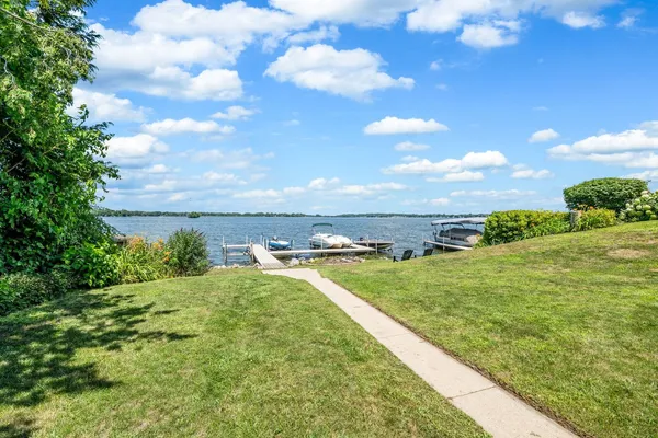 a view of a lake with couches