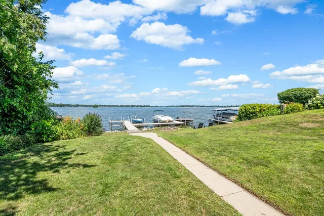 a view of a lake with couches