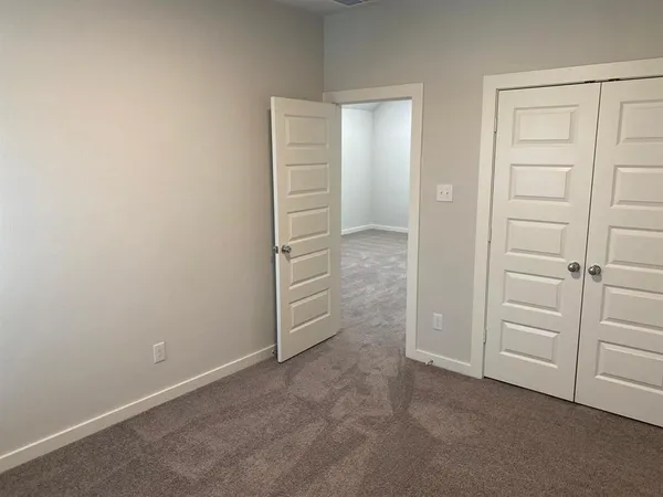 wooden view of closet area