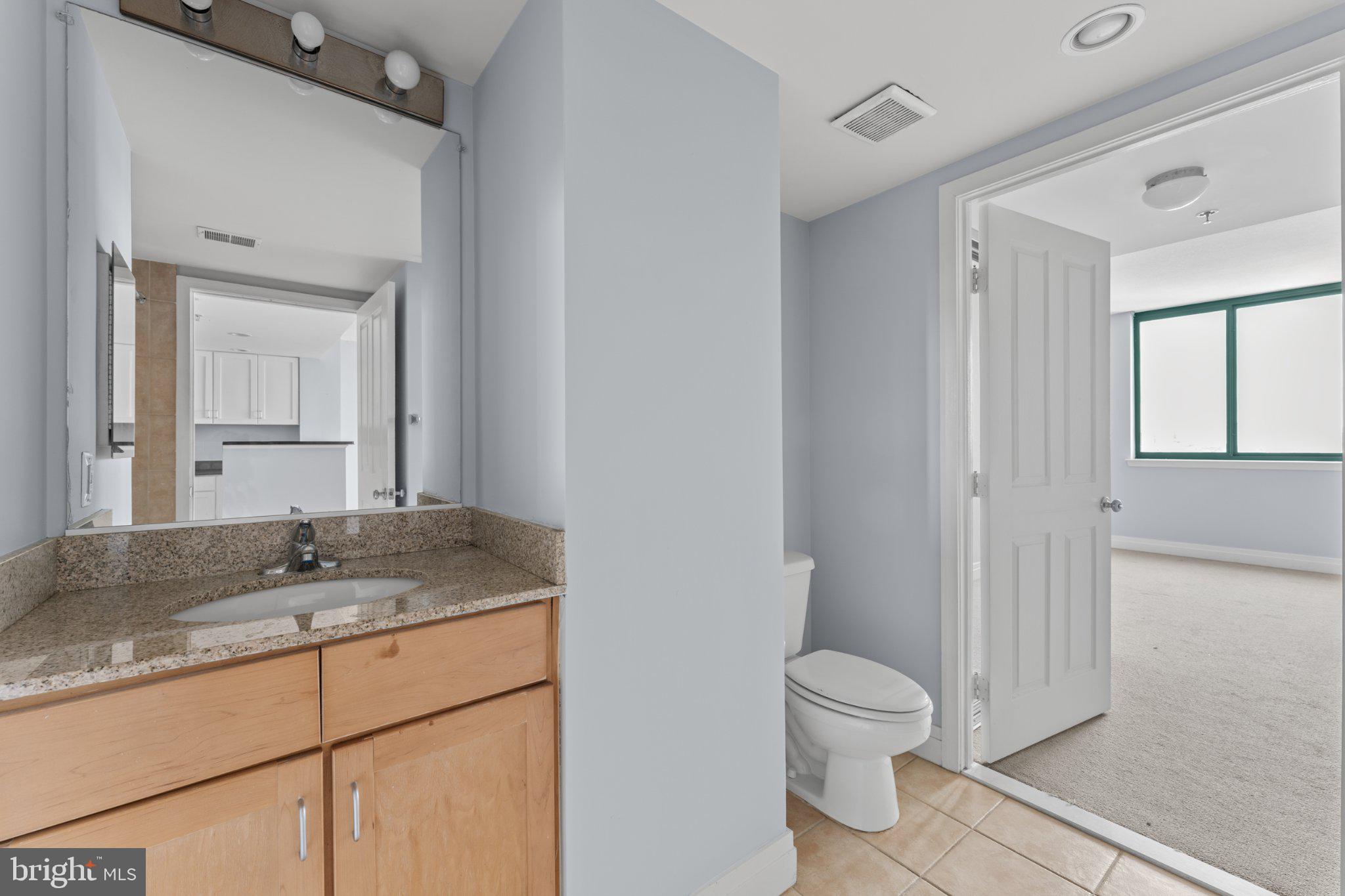 414 Water Street, Unit 1306 Baltimore, MD 21202 - Photo 25 of 29 Modern bathroom with sleek finishes.