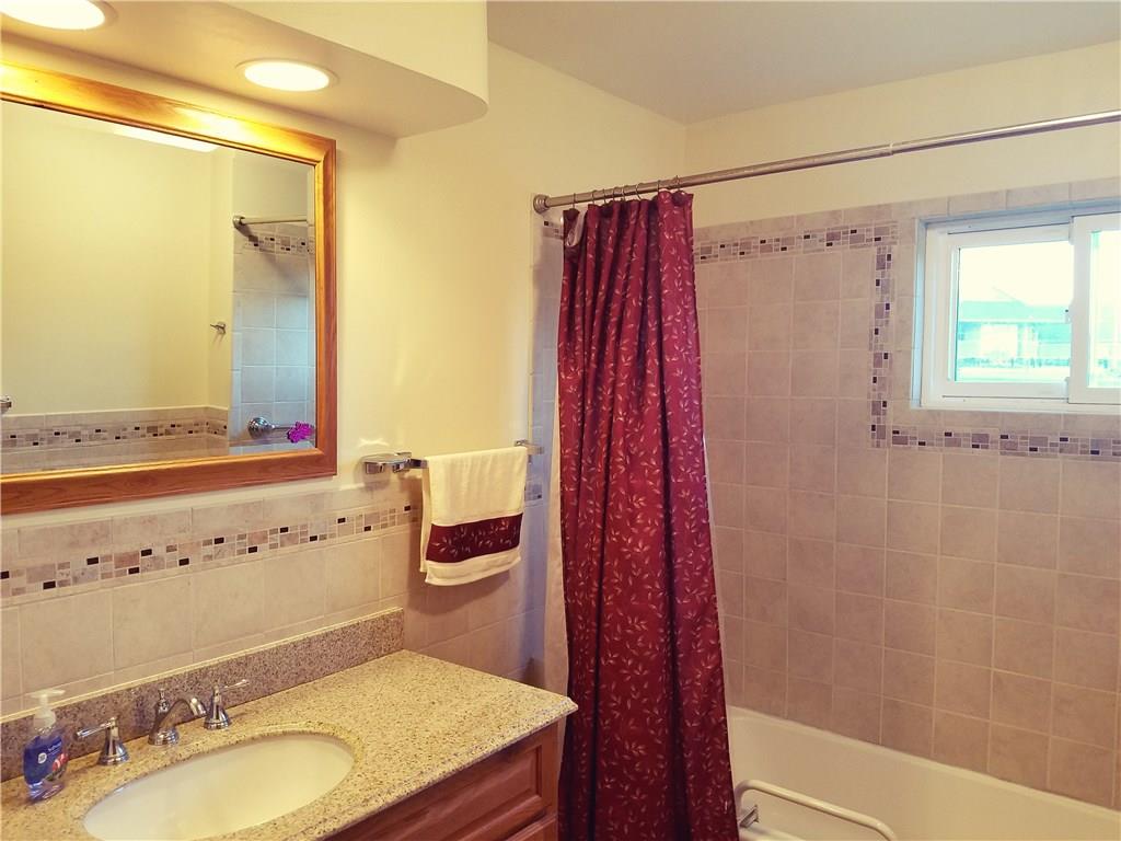 403 Whitestown Road Butler, PA 16001 - Photo 11 of 23 Both bathrooms on main level have been updated with tile.