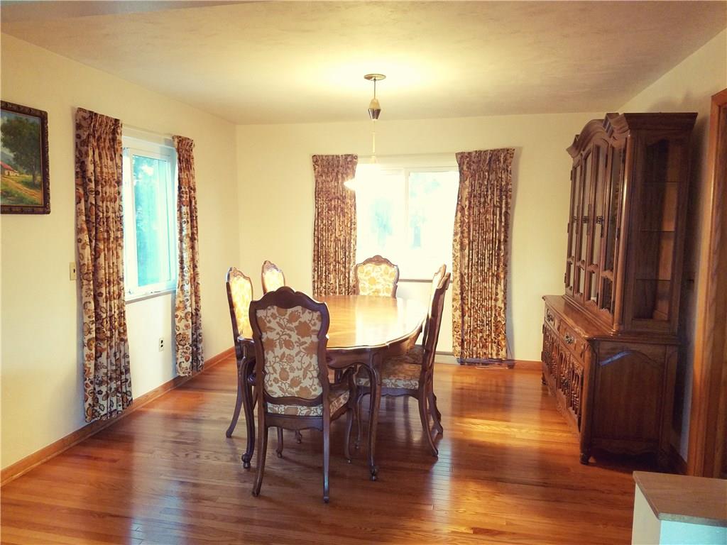 403 Whitestown Road Butler, PA 16001 - Photo 10 of 23 Formal dining room right off kitchen and open to living room.