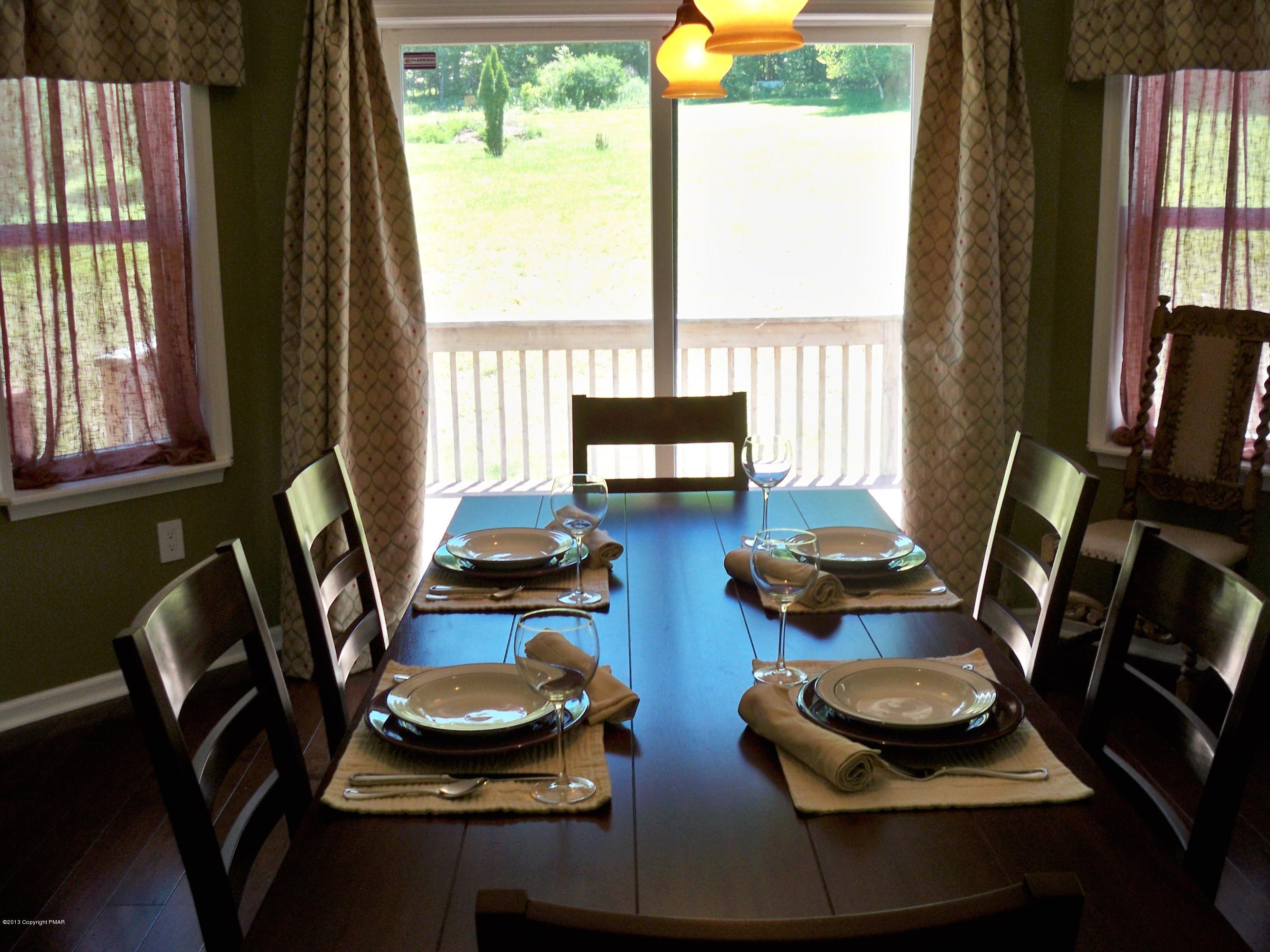420 Blue Ridge Road Saylorsburg, PA 18353 - Photo 14 of 32 a room with furniture and a window