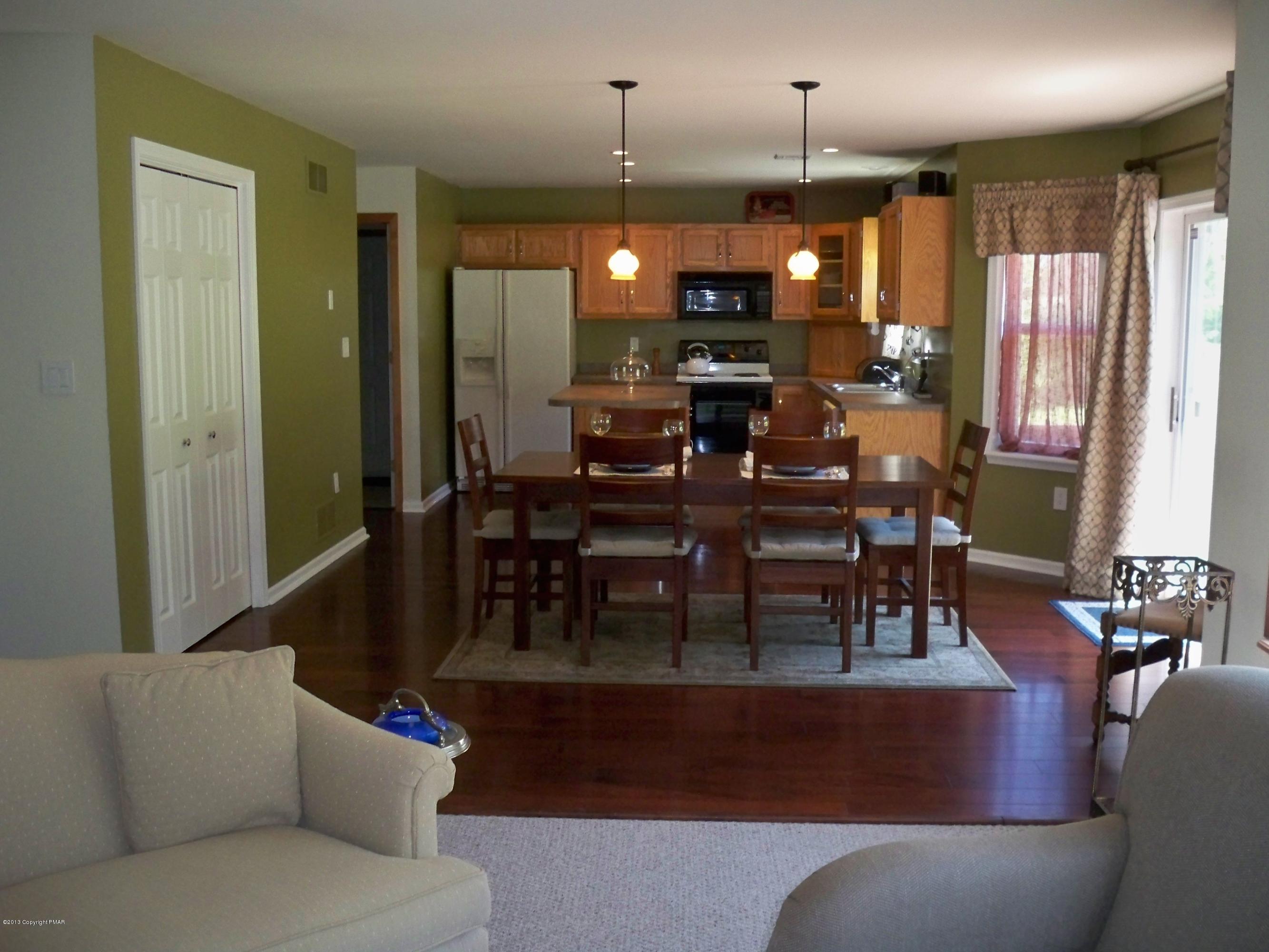 420 Blue Ridge Road Saylorsburg, PA 18353 - Photo 17 of 32 a view of a dining room with furniture and window