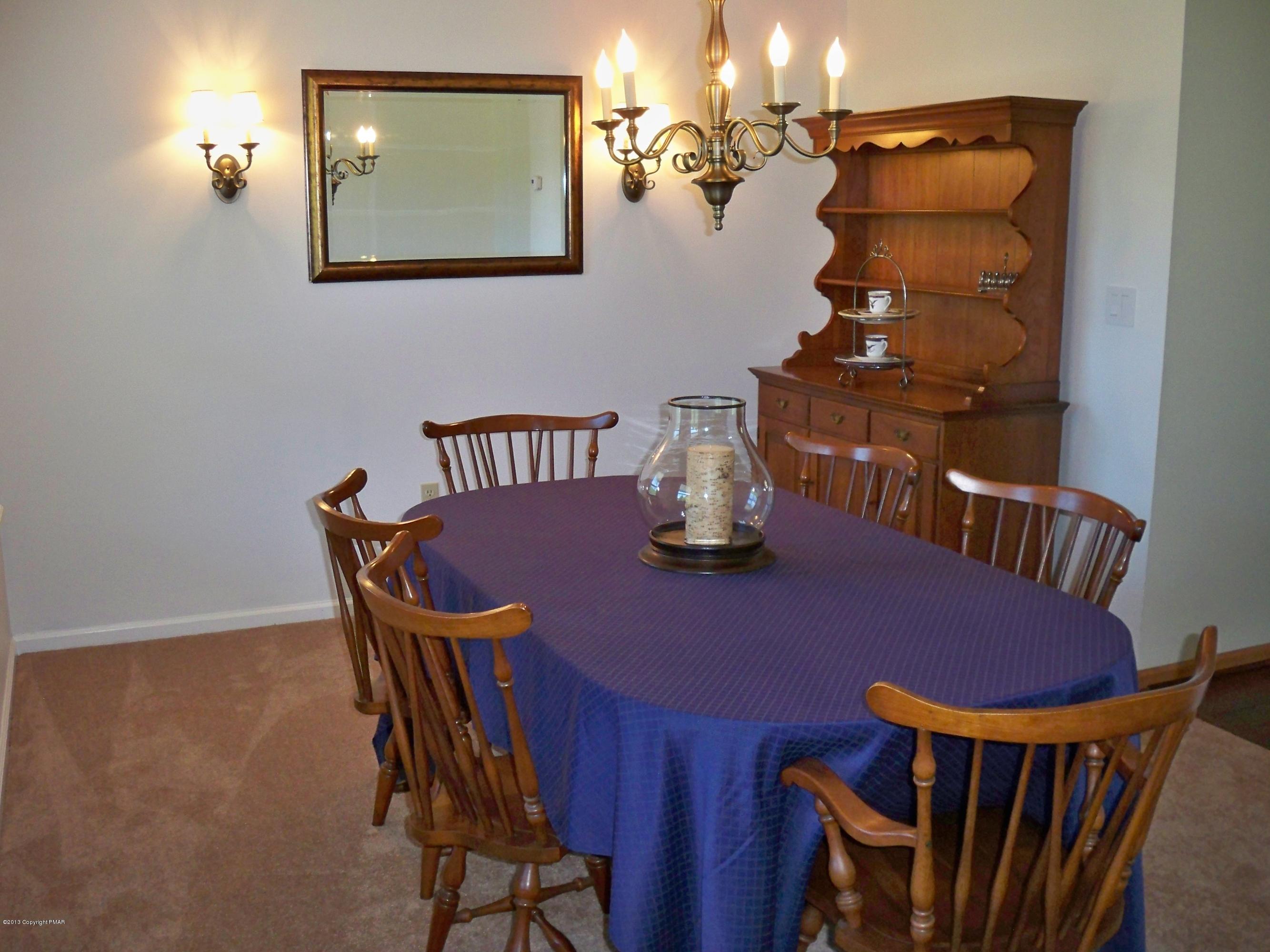 420 Blue Ridge Road Saylorsburg, PA 18353 - Photo 19 of 32 a view of a dining room with furniture and wooden floor