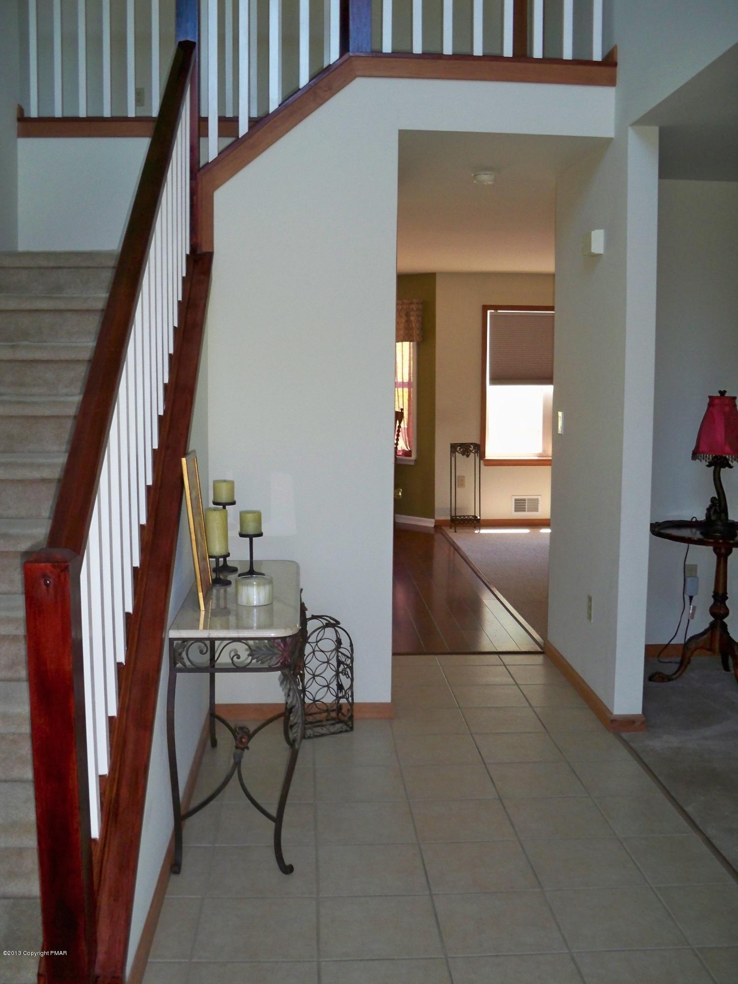 420 Blue Ridge Road Saylorsburg, PA 18353 - Photo 20 of 32 a view of entryway and hall with wooden floor