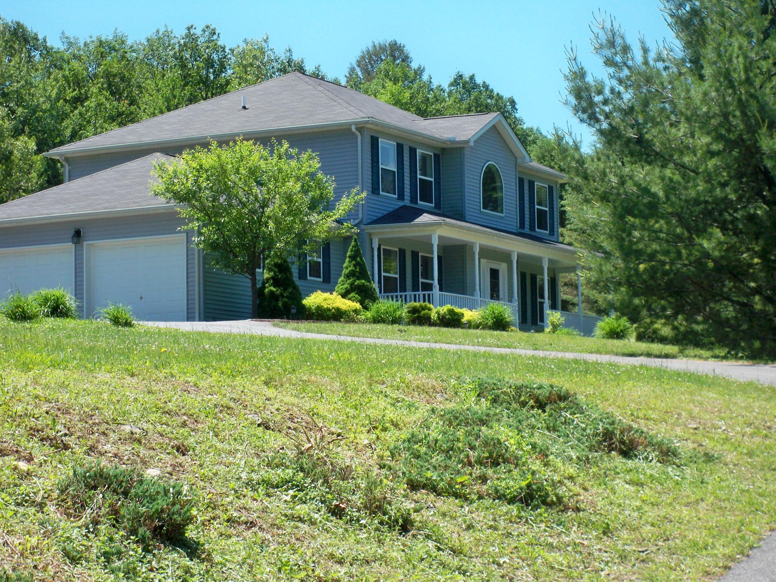 420 Blue Ridge Road Saylorsburg, PA 18353 - Photo 2 of 32 a view of a house with a yard
