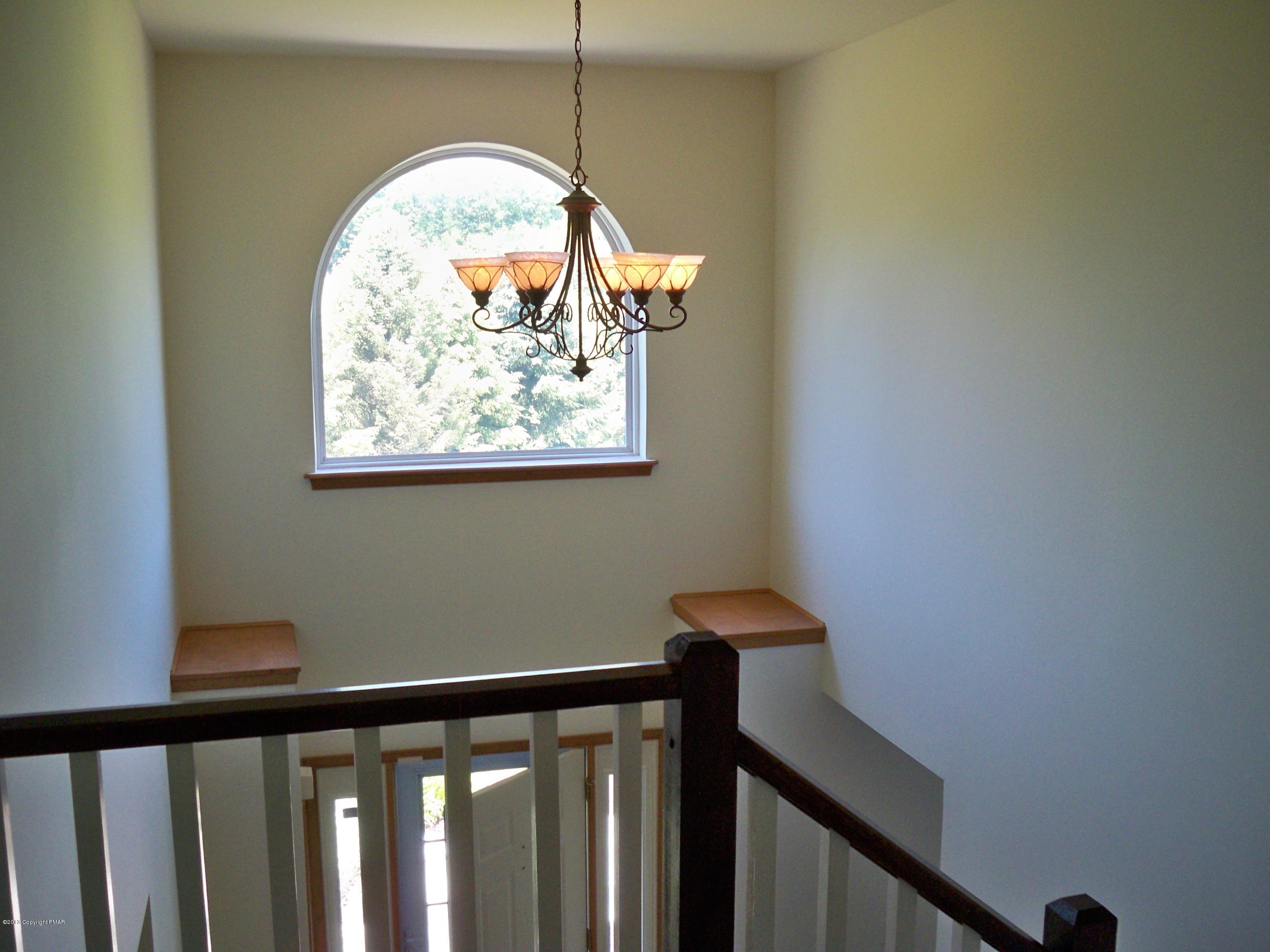 420 Blue Ridge Road Saylorsburg, PA 18353 - Photo 26 of 32 a view of a hallway with a window