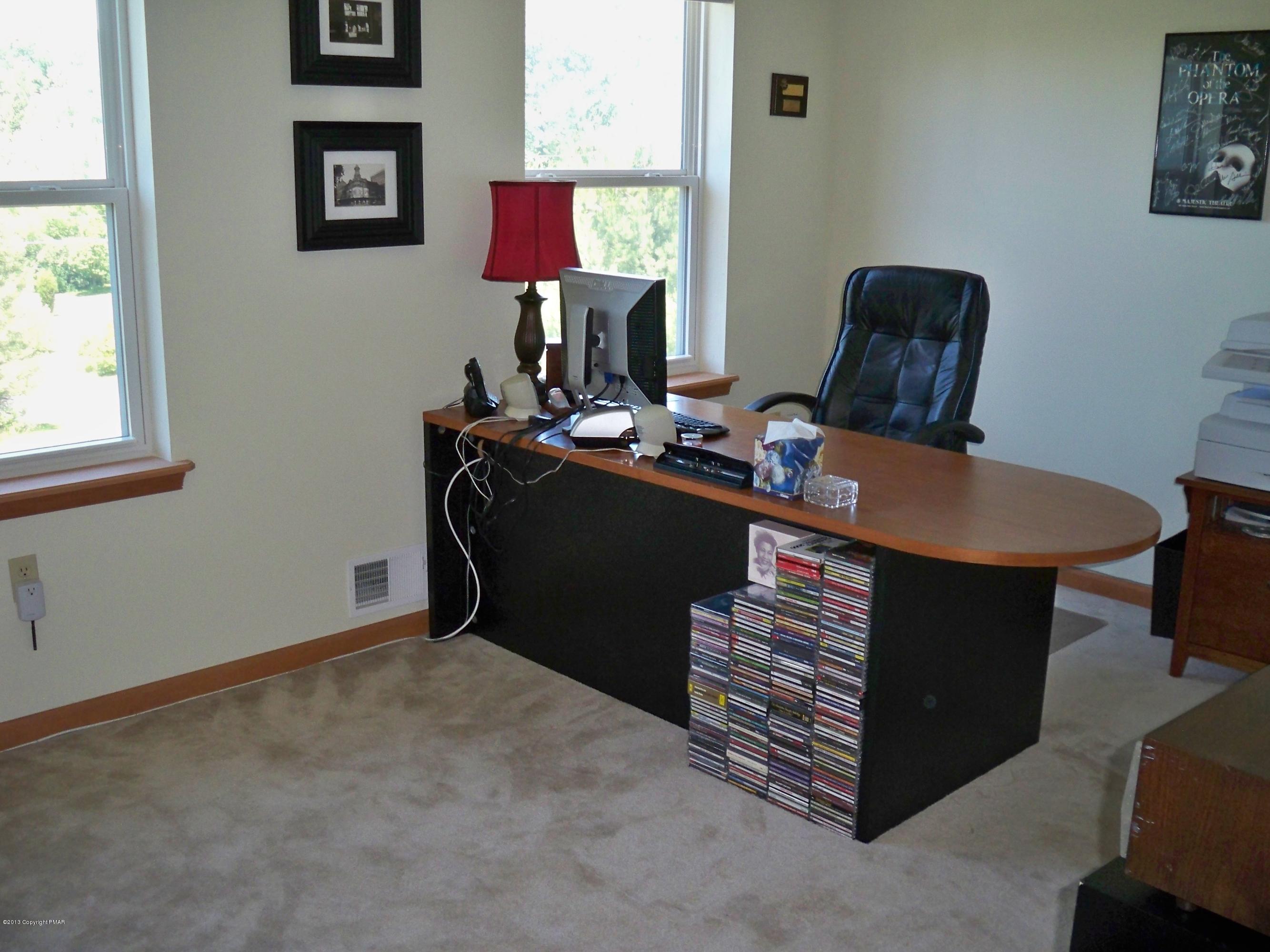 420 Blue Ridge Road Saylorsburg, PA 18353 - Photo 28 of 32 a room with a desk and a window