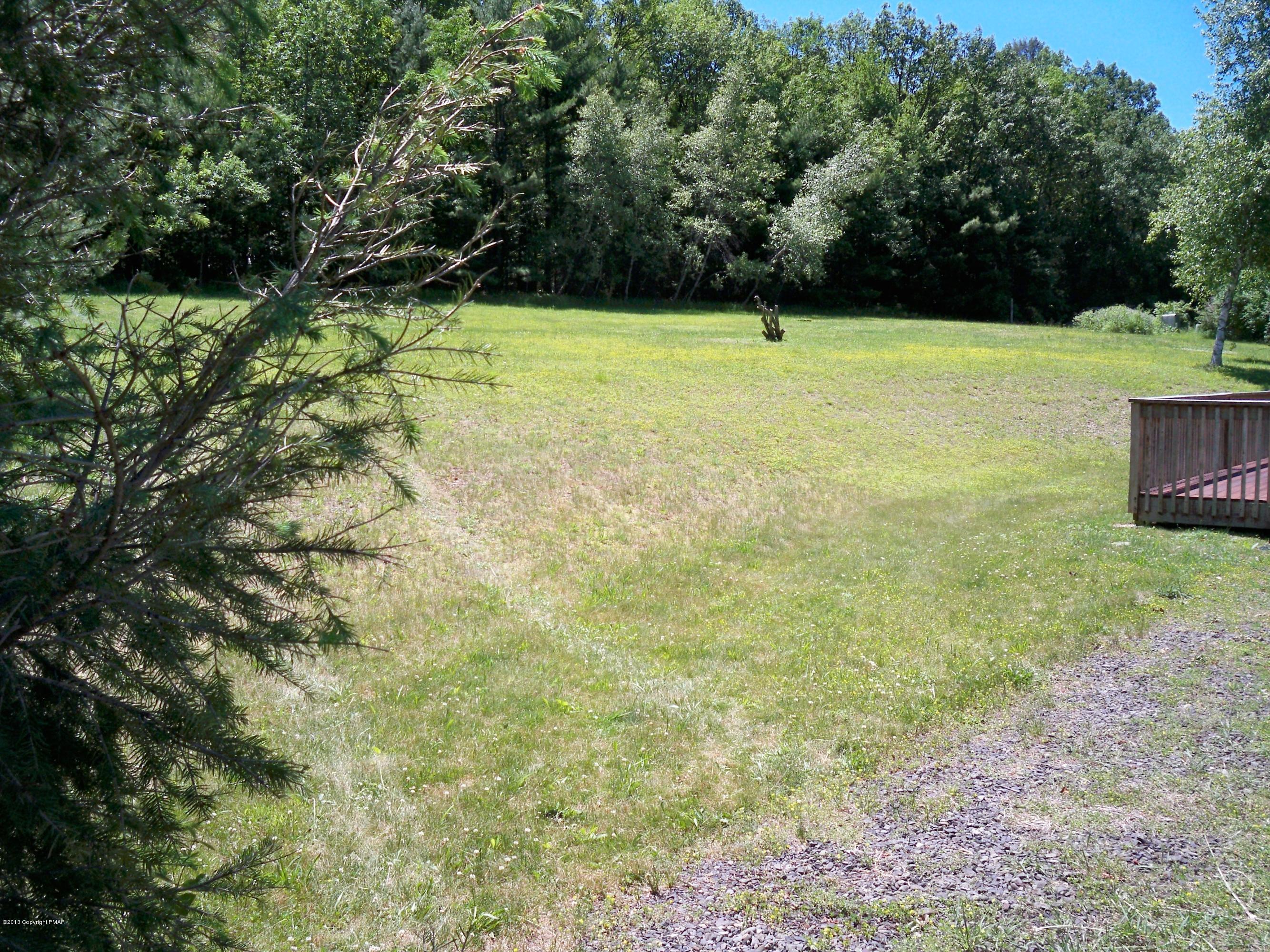 420 Blue Ridge Road Saylorsburg, PA 18353 - Photo 8 of 32 a view of a yard with an outdoor space