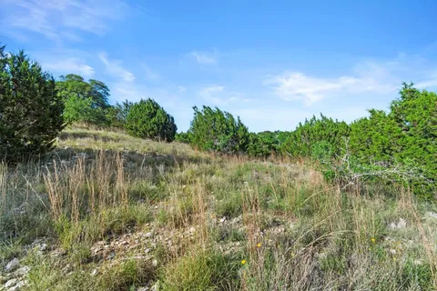 a view of a lake from a yard