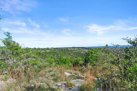 a view of a lake from a yard