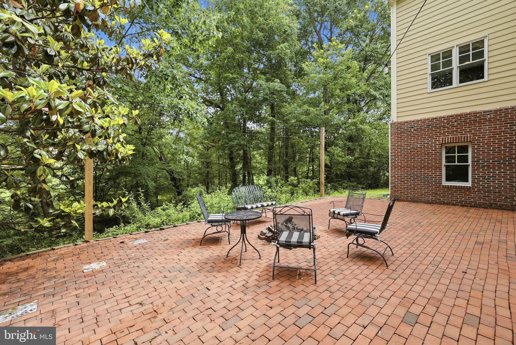 2608 Hunter Mill Road Oakton, VA 22124 - Photo 34 of 50 Walkout patio from rec room with hot tub