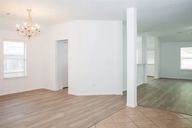 a kitchen with stainless steel appliances a sink stove and cabinets