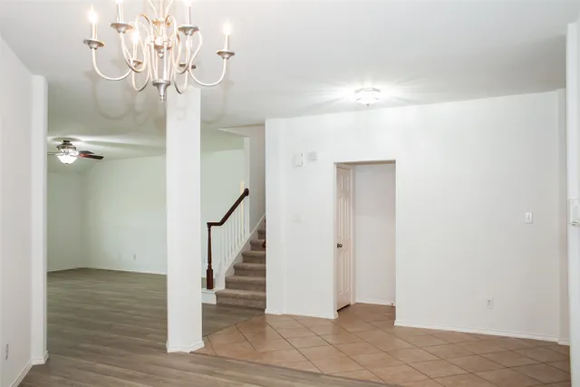 a kitchen with a sink counter top space cabinets and stainless steel appliances