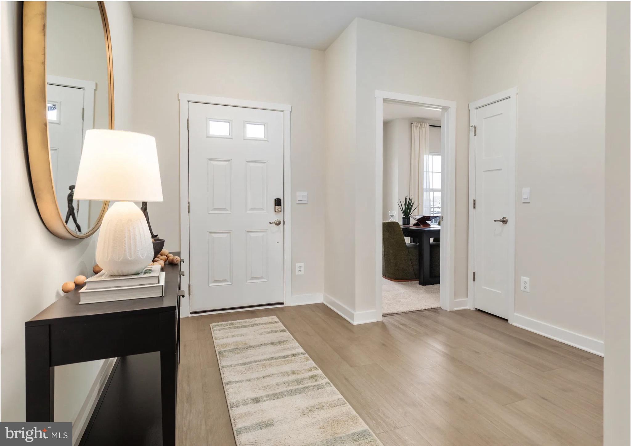 4 Bowens Run Road Bealeton, VA 22712 - Photo 2 of 21 a view of a livingroom with wooden floor and furniture