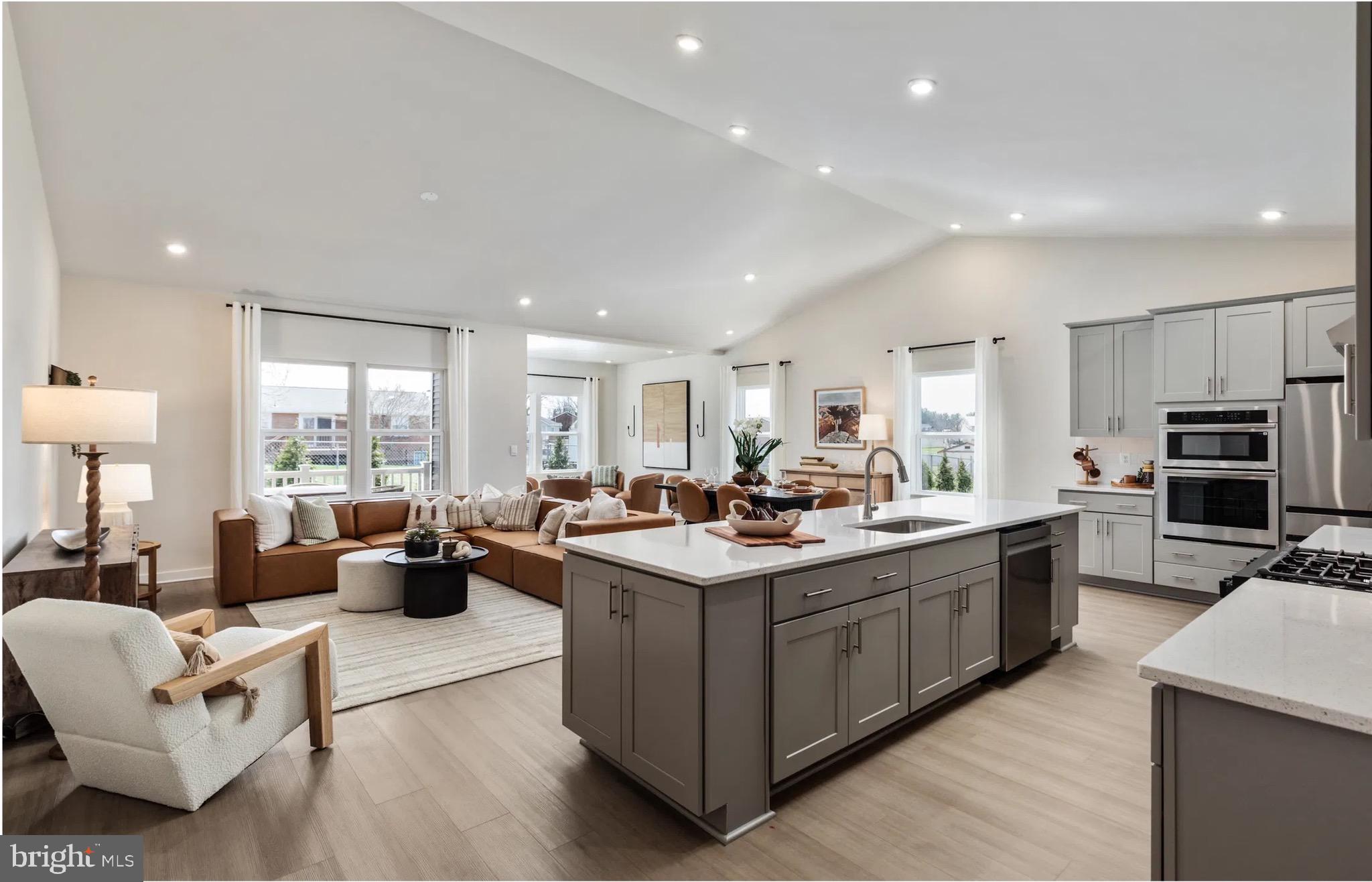 4 Bowens Run Road Bealeton, VA 22712 - Photo 5 of 21 a kitchen with stainless steel appliances granite countertop a stove oven and a refrigerator