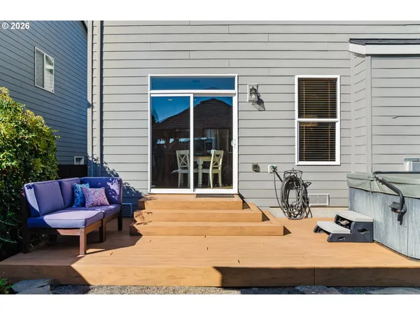 a view of a backyard with sitting area