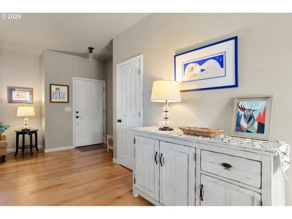 a view of cabinets with wooden floor and furniture