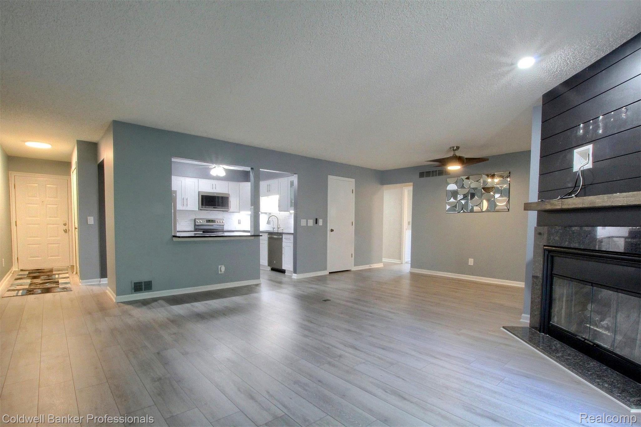 11765 Sycamore Road Plymouth, MI 48170 - Photo 9 of 25 9-Living-Room-3rd-View.jpg